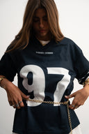 Navy mesh jersey with soft breathable texture, relaxed drapey fit, bold “97” front graphic with logo, white contrast details and double stripe on sleeve for sporty edge by Sleeves Studios