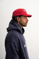 Washed navy oversized hoodie in premium heavyweight cotton, ultra-soft feel, with SLV logo and “Smile Baby” print on front, designed for comfort and vintage vibes by Sleeves Studios