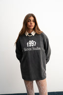Washed grey 310gsm cotton long sleeve shirt, loose slightly cropped fit, bold “1997” graphic and Sleeves Studios logo on front, soft feel with structured drape