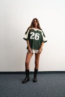 Green and white cropped mesh football jersey with boxy fit, breathable lightweight fabric, contrast shoulder panels, large “26” front print, and Sleeves Studios brand icon on back