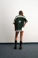 Green and white cropped mesh football jersey with boxy fit, breathable lightweight fabric, contrast shoulder panels, large “26” front print, and Sleeves Studios brand icon on back