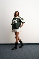 Green and white cropped mesh football jersey with boxy fit, breathable lightweight fabric, contrast shoulder panels, large “26” front print, and Sleeves Studios brand icon on back