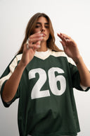 Green and white cropped mesh football jersey with boxy fit, breathable lightweight fabric, contrast shoulder panels, large “26” front print, and Sleeves Studios brand icon on back