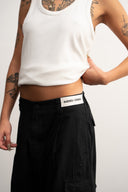 White cotton tank top, 100% cotton fabric, stretch fit, Sleeves Studios logo on back, SMILE BABY text printed