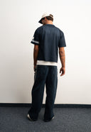 Navy mesh jersey with soft breathable texture, relaxed drapey fit, bold “97” front graphic with logo, white contrast details and double stripe on sleeve for sporty edge by Sleeves Studios