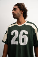Green and white cropped mesh football jersey with boxy fit, breathable lightweight fabric, contrast shoulder panels, large “26” front print, and Sleeves Studios brand icon on back